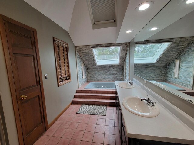 2215 N Shore Dr, Delavan, WI 53115 - bathroom featuring a bath, baseboards, double vanity, a sink, and tile patterned flooring