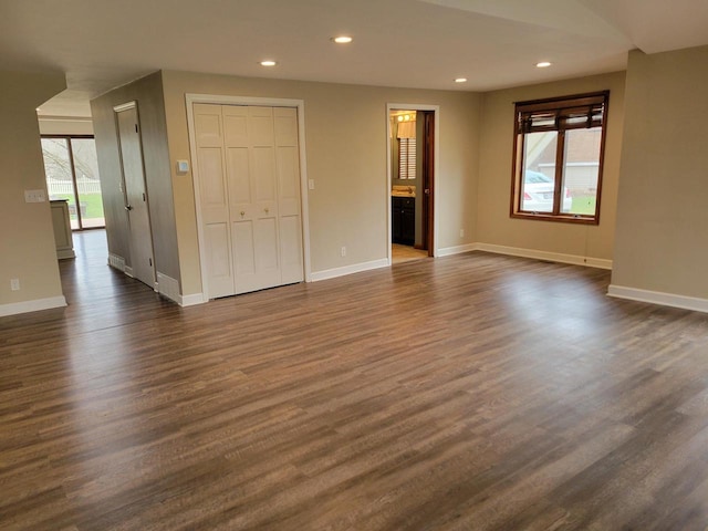 2215 N Shore Dr, Delavan, WI 53115 - interior space featuring plenty of natural light, baseboards, recessed lighting, and dark wood-style flooring