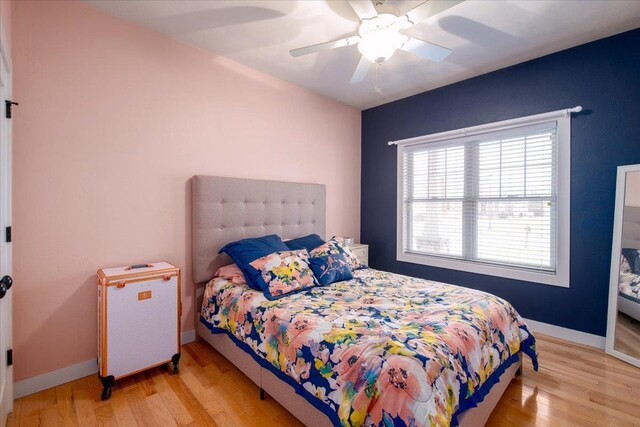 3265 Casey Trl, Oshkosh, WI 54904 - bedroom featuring baseboards, ceiling fan, and wood finished floors