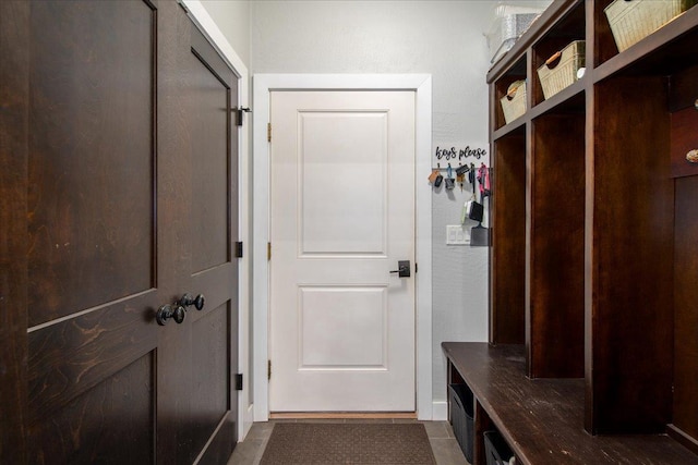 3265 Casey Trl, Oshkosh, WI 54904 - mudroom featuring dark tile patterned flooring