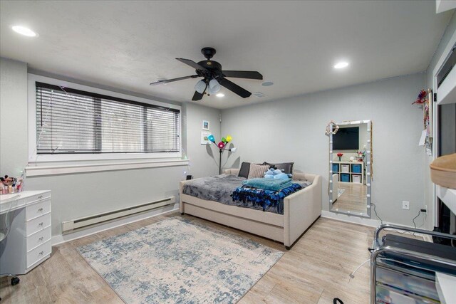 3265 Casey Trl, Oshkosh, WI 54904 - bedroom with ceiling fan, wood finished floors, a baseboard heating unit, and recessed lighting