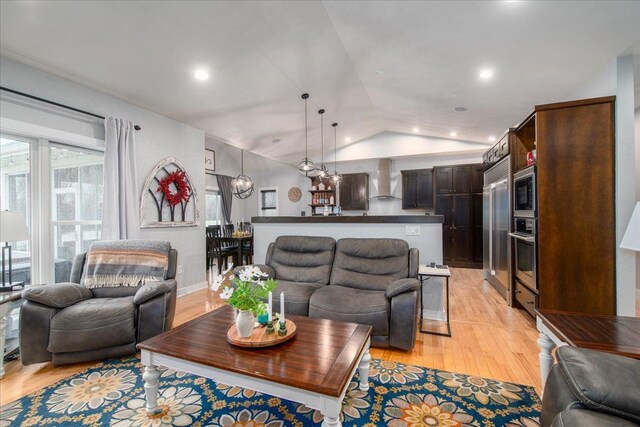 3265 Casey Trl, Oshkosh, WI 54904 - living room with light wood-style floors and lofted ceiling