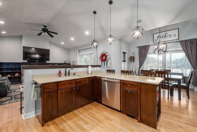 3265 Casey Trl, Oshkosh, WI 54904 - kitchen with light countertops, ceiling fan, a sink, open floor plan, and stainless steel dishwasher