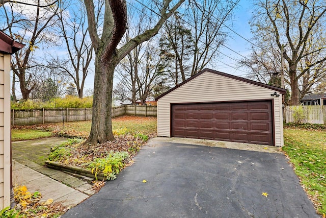 detached garage with fence