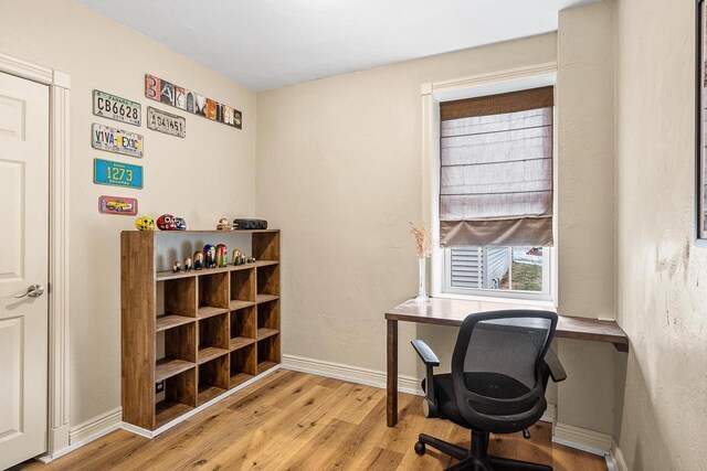 3304 Nicolet Dr, Green Bay, WI 54311 - office area featuring baseboards and wood finished floors