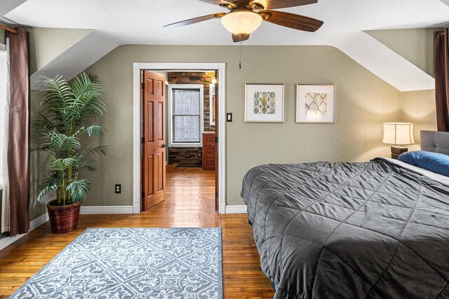 3304 Nicolet Dr, Green Bay, WI 54311 - bedroom featuring baseboards, vaulted ceiling, wood finished floors, and a ceiling fan