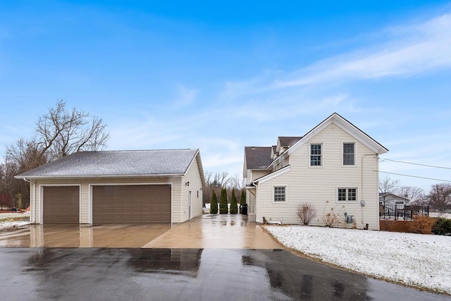 3304 Nicolet Dr, Green Bay, WI 54311 - view of home's exterior featuring an outbuilding and a detached garage