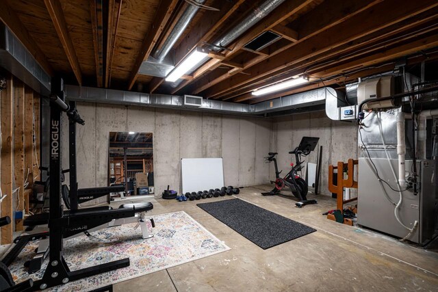 4824 Hampton Ct, Mount Pleasant, WI 53403 - exercise room with heating unit and visible vents
