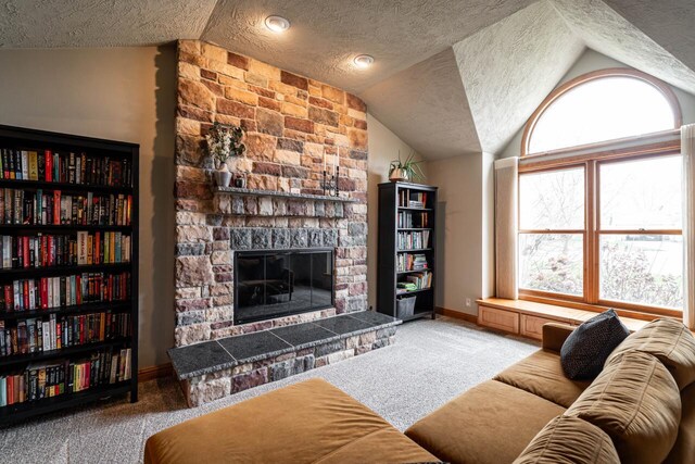 4824 Hampton Ct, Mount Pleasant, WI 53403 - carpeted living area with lofted ceiling, a textured ceiling, and baseboards