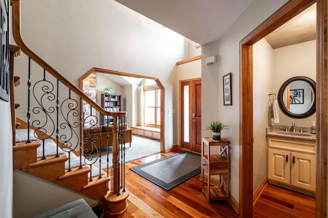 4824 Hampton Ct, Mount Pleasant, WI 53403 - foyer entrance with hardwood / wood-style flooring, baseboards, and stairs
