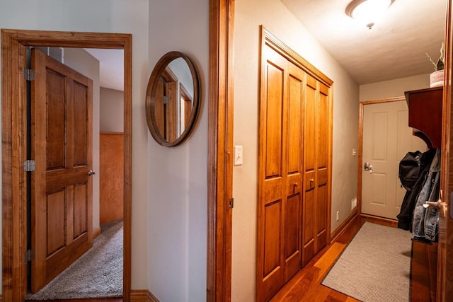 4824 Hampton Ct, Mount Pleasant, WI 53403 - corridor featuring wood finished floors