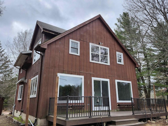 N9148 Sandy Lake Rd, Neshkoro, WI 54960 - back of property with roof with shingles and a wooden deck