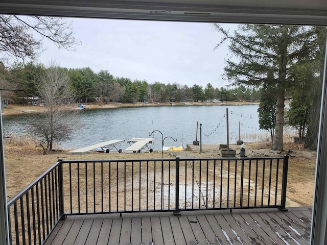 N9148 Sandy Lake Rd, Neshkoro, WI 54960 - wooden deck featuring a water view and a boat dock