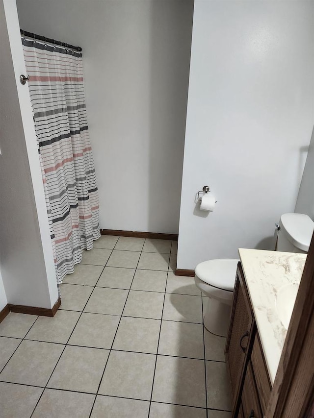 N9148 Sandy Lake Rd, Neshkoro, WI 54960 - full bath featuring tile patterned flooring, vanity, toilet, and baseboards