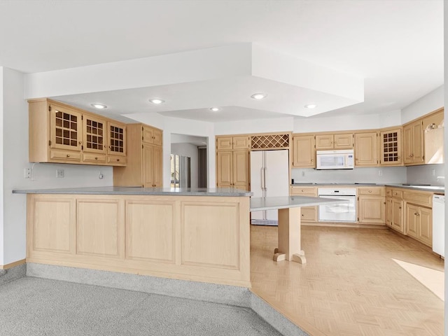 535 E Vine Ct, Sturgeon Bay, WI 54235 - kitchen featuring a peninsula, white appliances, recessed lighting, glass insert cabinets, and light brown cabinetry