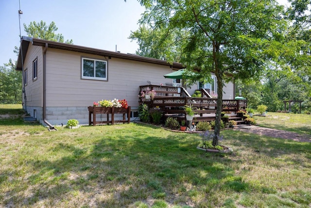 N9656 19th Ave, Necedah, WI 54646 - back of property featuring a wooden deck and a yard