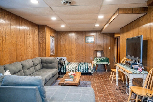 N9656 19th Ave, Necedah, WI 54646 - living room featuring brick patterned floor, visible vents, wood walls, and recessed lighting