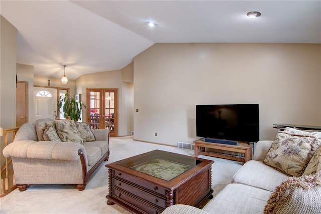 4330 S Pointe Ct, Eau Claire, WI 54701 - living area with baseboards, light carpet, french doors, visible vents, and lofted ceiling