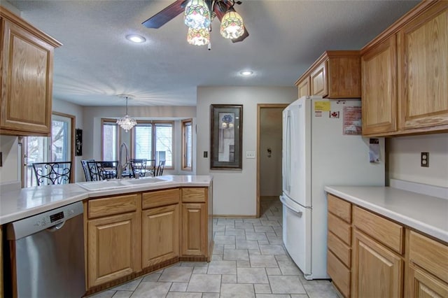 4330 S Pointe Ct, Eau Claire, WI 54701 - kitchen featuring stainless steel dishwasher, freestanding refrigerator, a ceiling fan, light countertops, and a sink