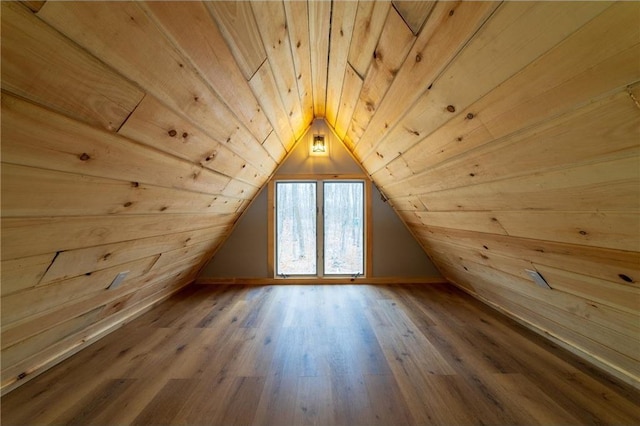 61128 Fleming Loop, Askov, MN 55704 - bonus room with lofted ceiling, wood finished floors, wooden ceiling, and wood walls