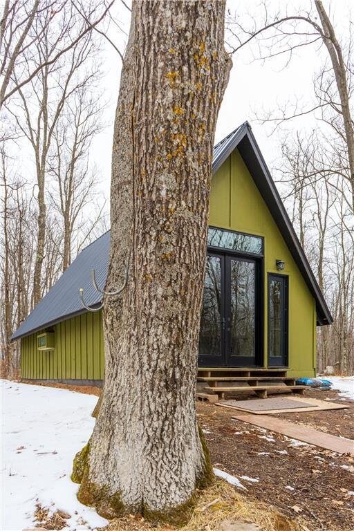 61128 Fleming Loop, Askov, MN 55704 - exterior space featuring french doors and entry steps