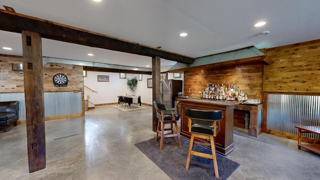 26350 Drake Ln, Cazenovia, WI 53924 - bar with a bar, recessed lighting, beam ceiling, finished concrete floors, and freestanding refrigerator