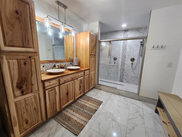 26350 Drake Ln, Cazenovia, WI 53924 - full bath with decorative backsplash, marble finish floor, a stall shower, and vanity