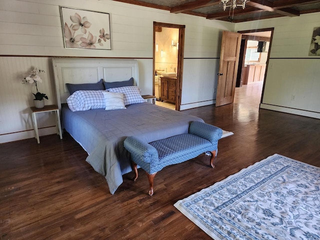 26350 Drake Ln, Cazenovia, WI 53924 - bedroom featuring ensuite bathroom, a baseboard radiator, wood finished floors, and beam ceiling