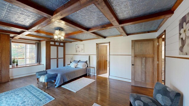 26350 Drake Ln, Cazenovia, WI 53924 - bedroom with wood finished floors, coffered ceiling, and beamed ceiling