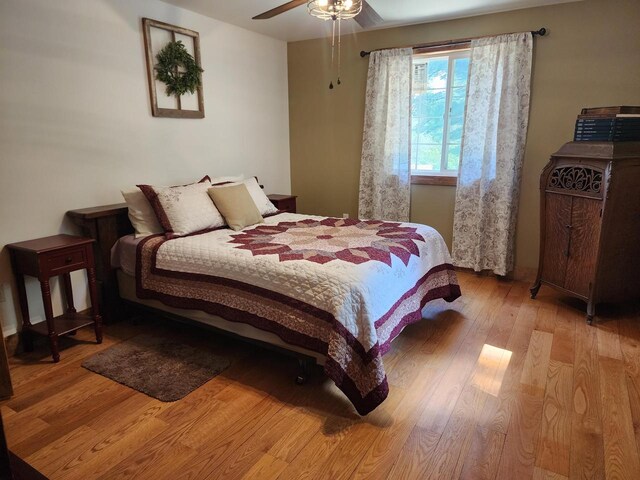 26350 Drake Ln, Cazenovia, WI 53924 - bedroom featuring ceiling fan and light wood finished floors