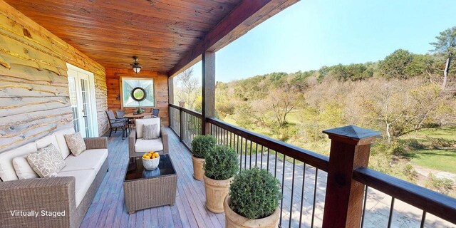 26350 Drake Ln, Cazenovia, WI 53924 - balcony with an outdoor hangout area and a forest view