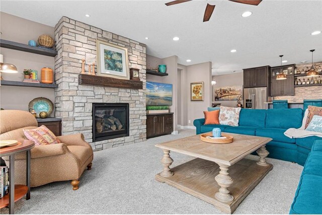 438 Highland Vw, Houlton, WI 54082 - living room featuring recessed lighting, a ceiling fan, a fireplace, and carpet
