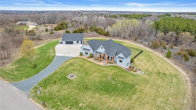 438 Highland Vw, Houlton, WI 54082 - birds eye view of property featuring a wooded view