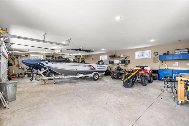 438 Highland Vw, Houlton, WI 54082 - garage featuring a garage door opener and recessed lighting