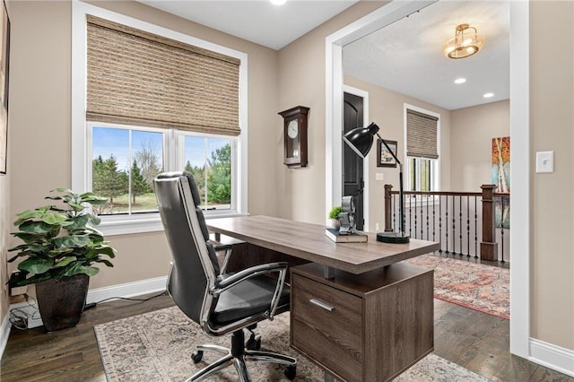 438 Highland Vw, Houlton, WI 54082 - home office with dark wood-type flooring, recessed lighting, and baseboards