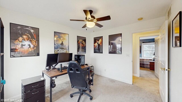 425 Maple Ln, Williams Bay, WI 53191 - office with light colored carpet, visible vents, baseboards, and a ceiling fan