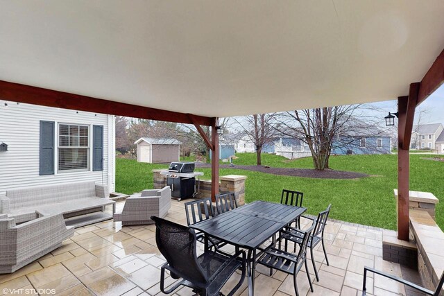 425 Maple Ln, Williams Bay, WI 53191 - view of patio / terrace with outdoor dining space, a storage unit, an outdoor structure, and area for grilling