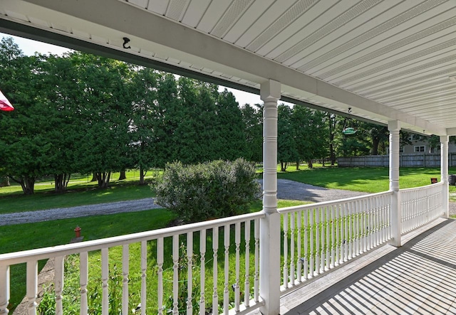 2855 N Shore Dr, Delavan, WI 53115 - deck with covered porch and a yard