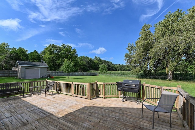 2855 N Shore Dr, Delavan, WI 53115 - wooden deck with a grill, an outdoor structure, a fenced backyard, a garage, and a yard