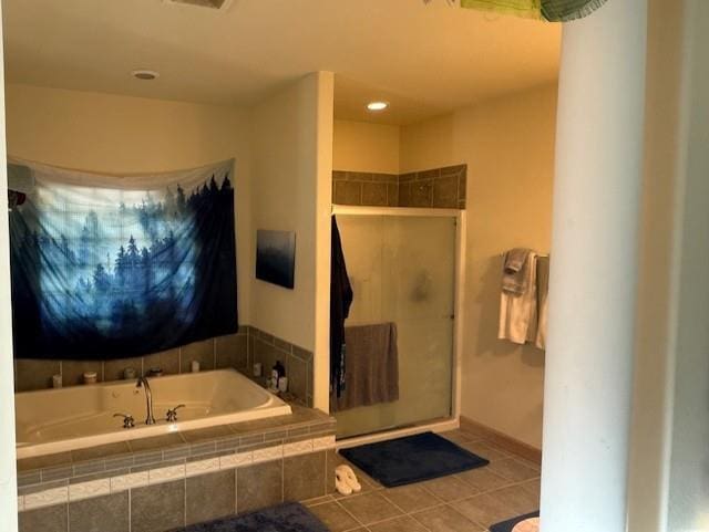 2026 Stonehaven Dr, Sun Prairie, WI 53590 - bathroom featuring tile patterned flooring, a shower stall, baseboards, visible vents, and a garden tub