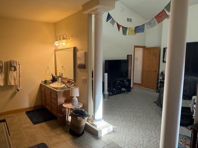 2026 Stonehaven Dr, Sun Prairie, WI 53590 - bathroom with visible vents, decorative columns, vanity, and baseboards