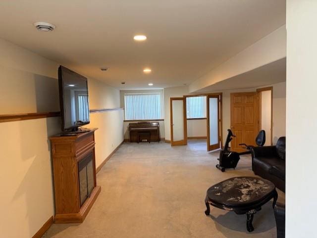 2026 Stonehaven Dr, Sun Prairie, WI 53590 - living area with recessed lighting, light carpet, and baseboards