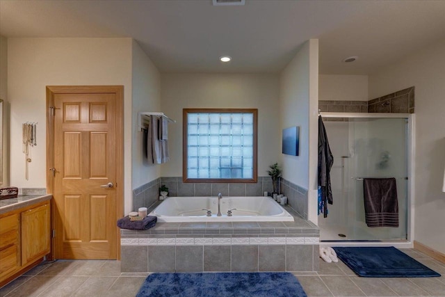 2026 Stonehaven Dr, Sun Prairie, WI 53590 - bathroom featuring tile patterned floors, a shower stall, a bath, vanity, and visible vents