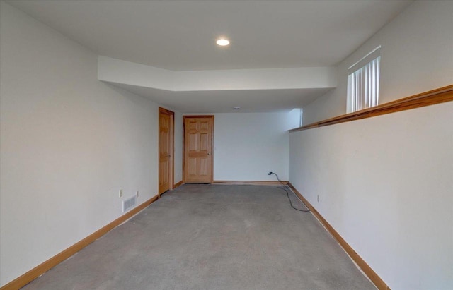 2026 Stonehaven Dr, Sun Prairie, WI 53590 - below grade area with light colored carpet, visible vents, recessed lighting, and baseboards