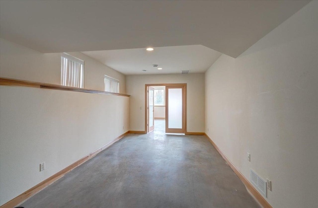 2026 Stonehaven Dr, Sun Prairie, WI 53590 - unfurnished room with baseboards, visible vents, finished concrete flooring, and recessed lighting