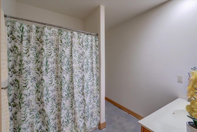 2026 Stonehaven Dr, Sun Prairie, WI 53590 - full bathroom with a shower with curtain, vanity, and baseboards