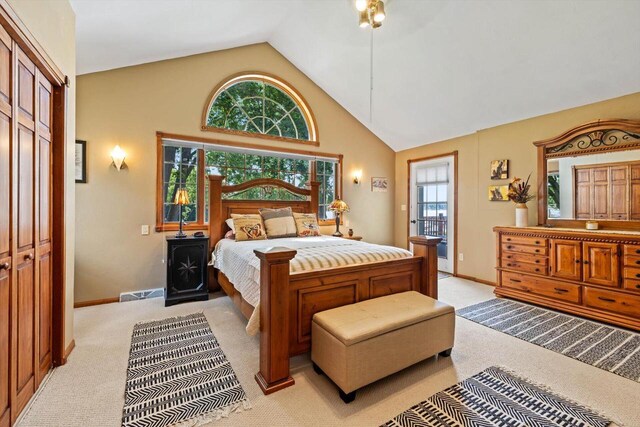 W1335 N Blue Spring Lake Dr, Palmyra, WI 53156 - bedroom featuring high vaulted ceiling, baseboards, light colored carpet, and visible vents