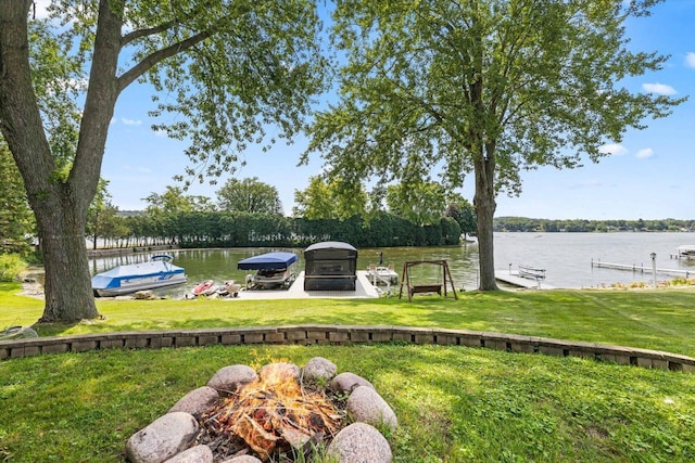W1335 N Blue Spring Lake Dr, Palmyra, WI 53156 - view of dock with a lawn and a water view