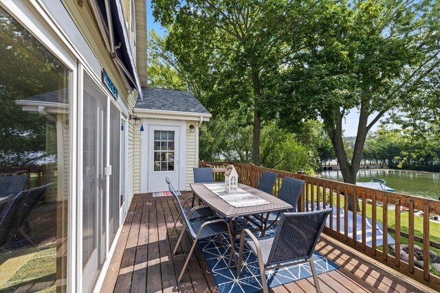 W1335 N Blue Spring Lake Dr, Palmyra, WI 53156 - wooden terrace featuring a water view and outdoor dining area