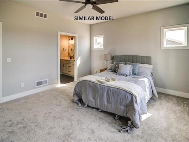 6643 Royal View Dr, Deforest, WI 53532 - carpeted bedroom with baseboards, visible vents, ensuite bath, and a ceiling fan